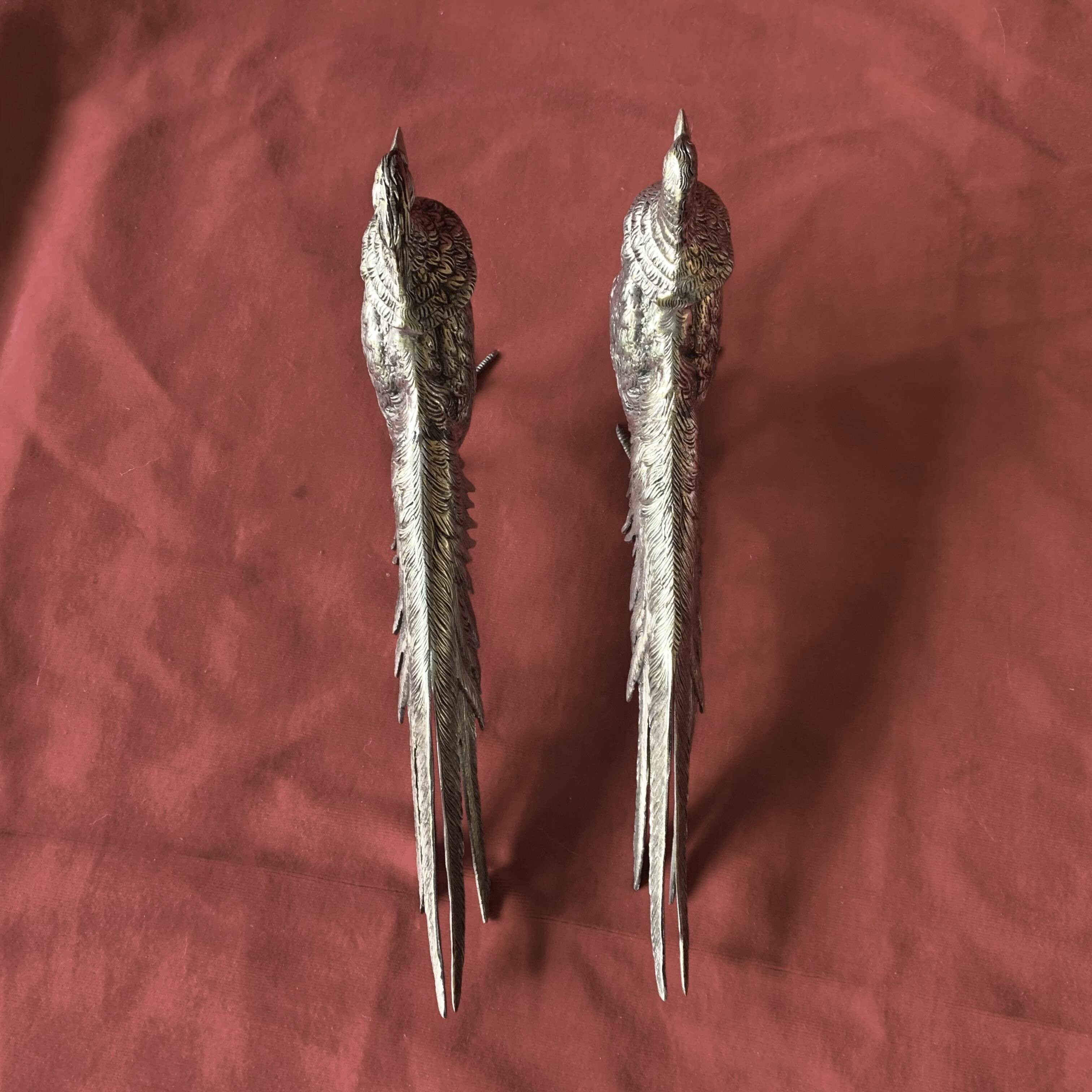 Couple de faisans décoratifs en métal argenté