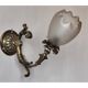 Bronze wall light with opaque glass tulip 1900