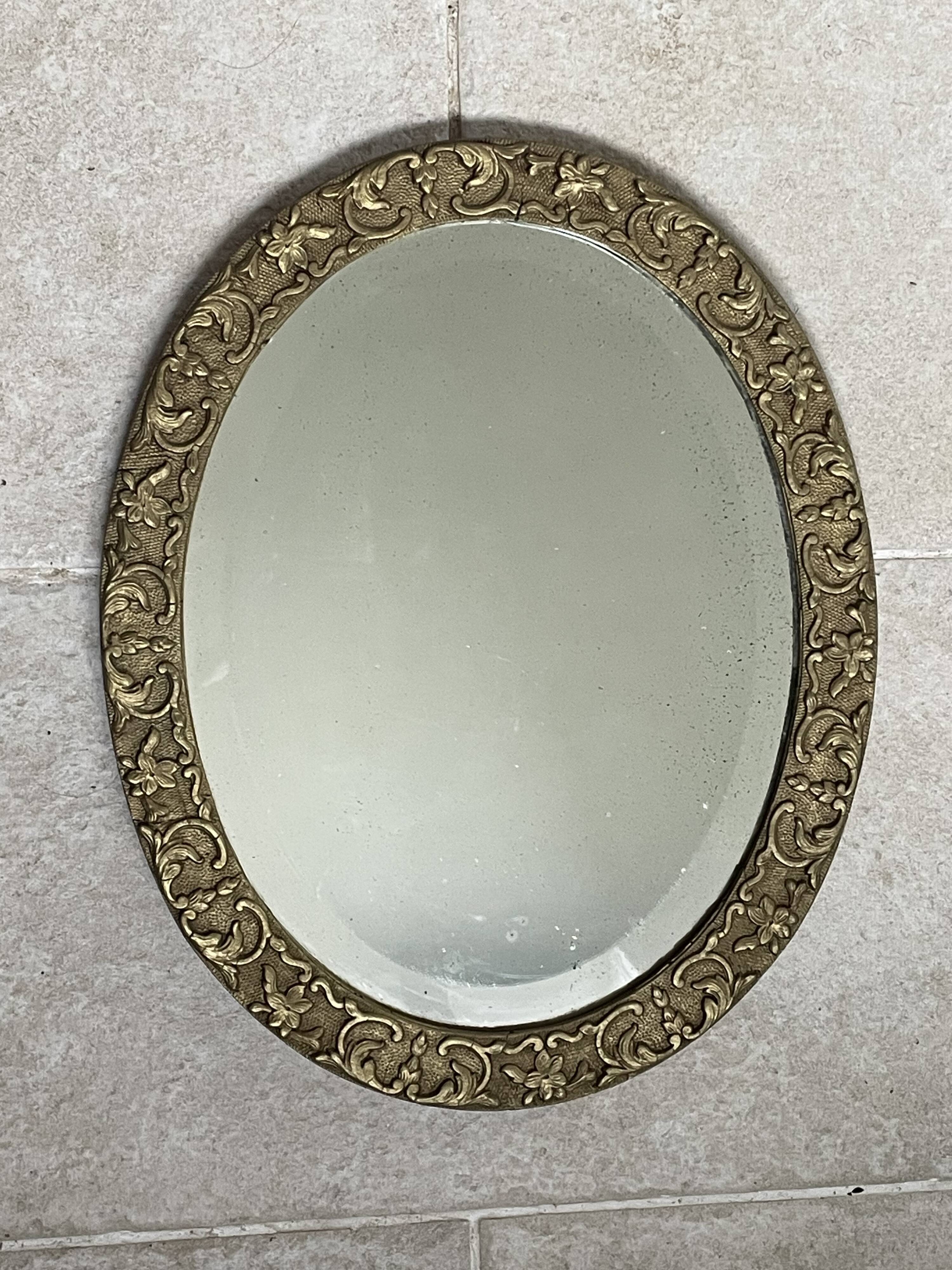 19th century beveled oval mirror