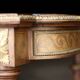 Superb Napoleon III table. Marquetry top and gilded bronzes.