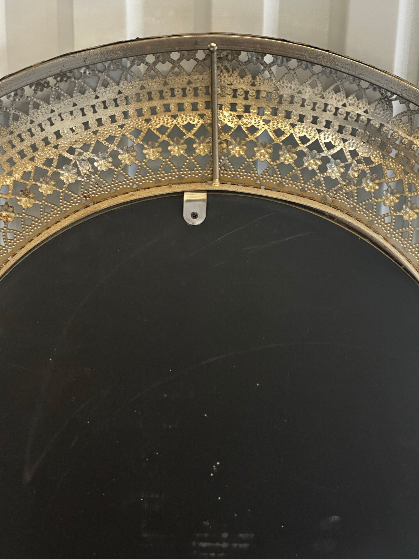 Large oriental mirror in pierced metal - H 116 cm