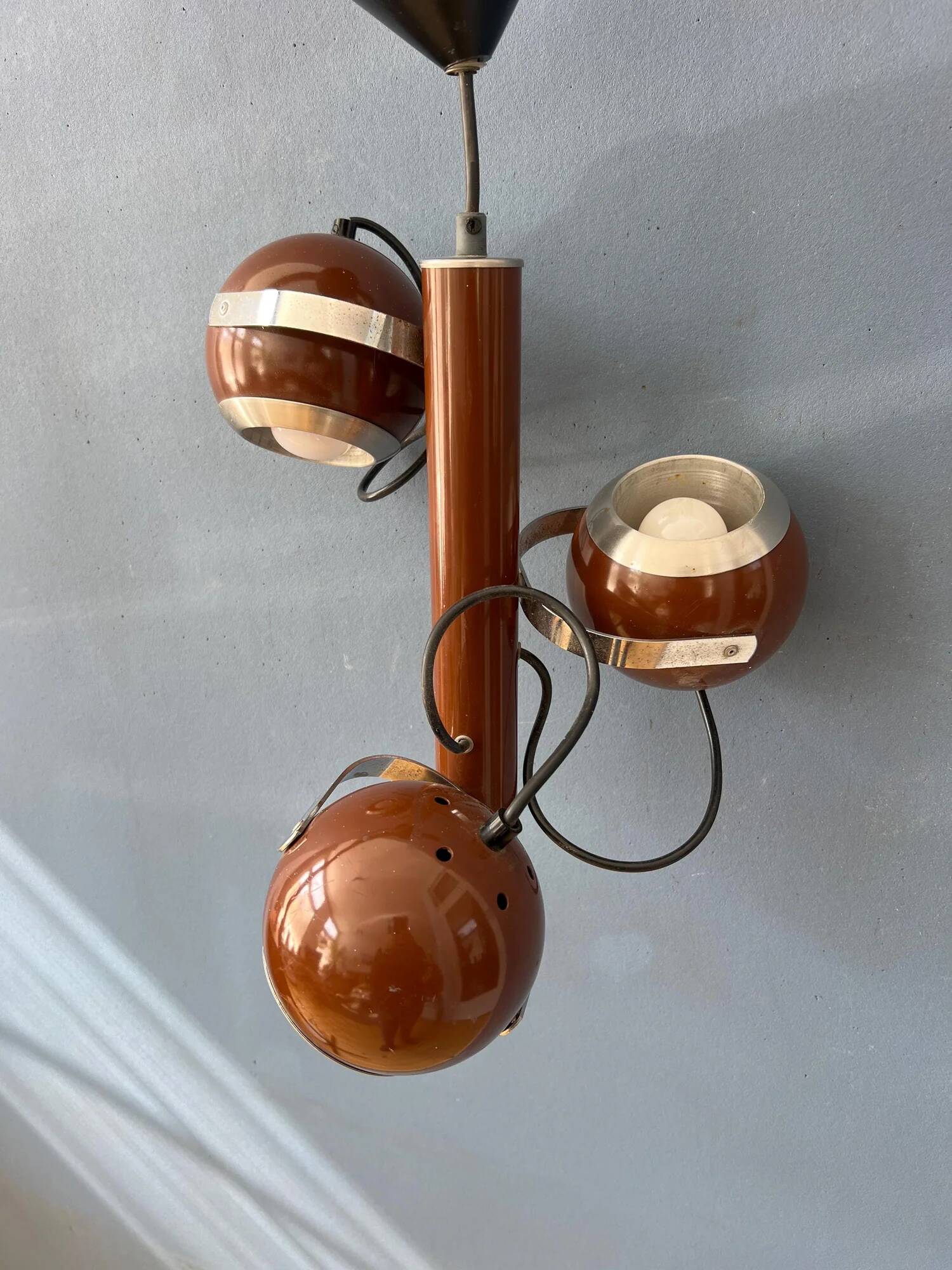 Brown vintage space age pendant lamp with three eyeball shades