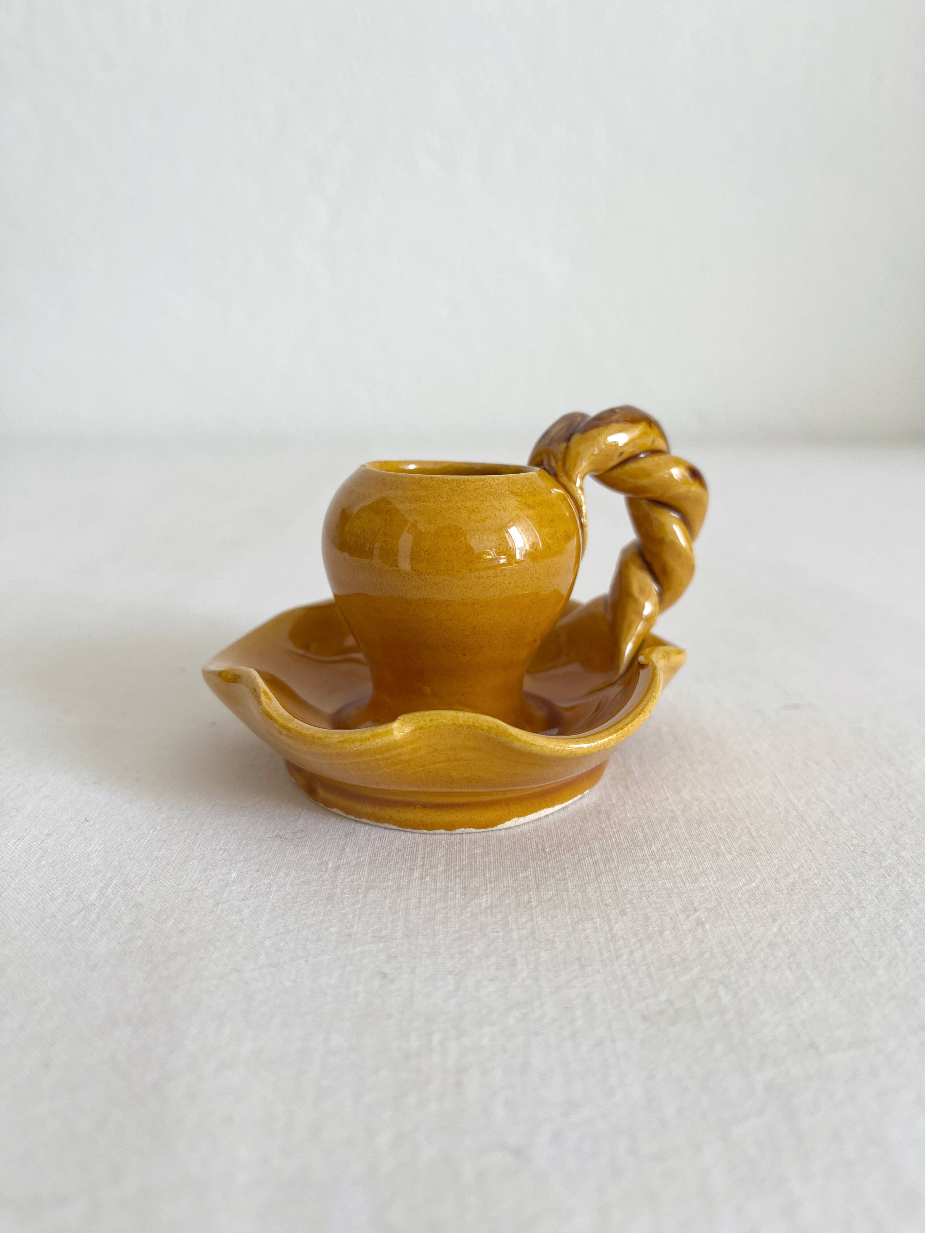 Mustard ceramic candle holder with vintage twisted handle