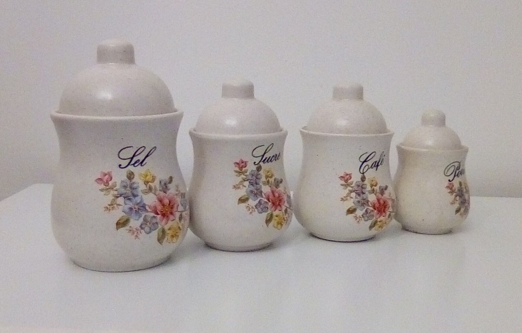 Series of 4 kitchen pots - floral motif