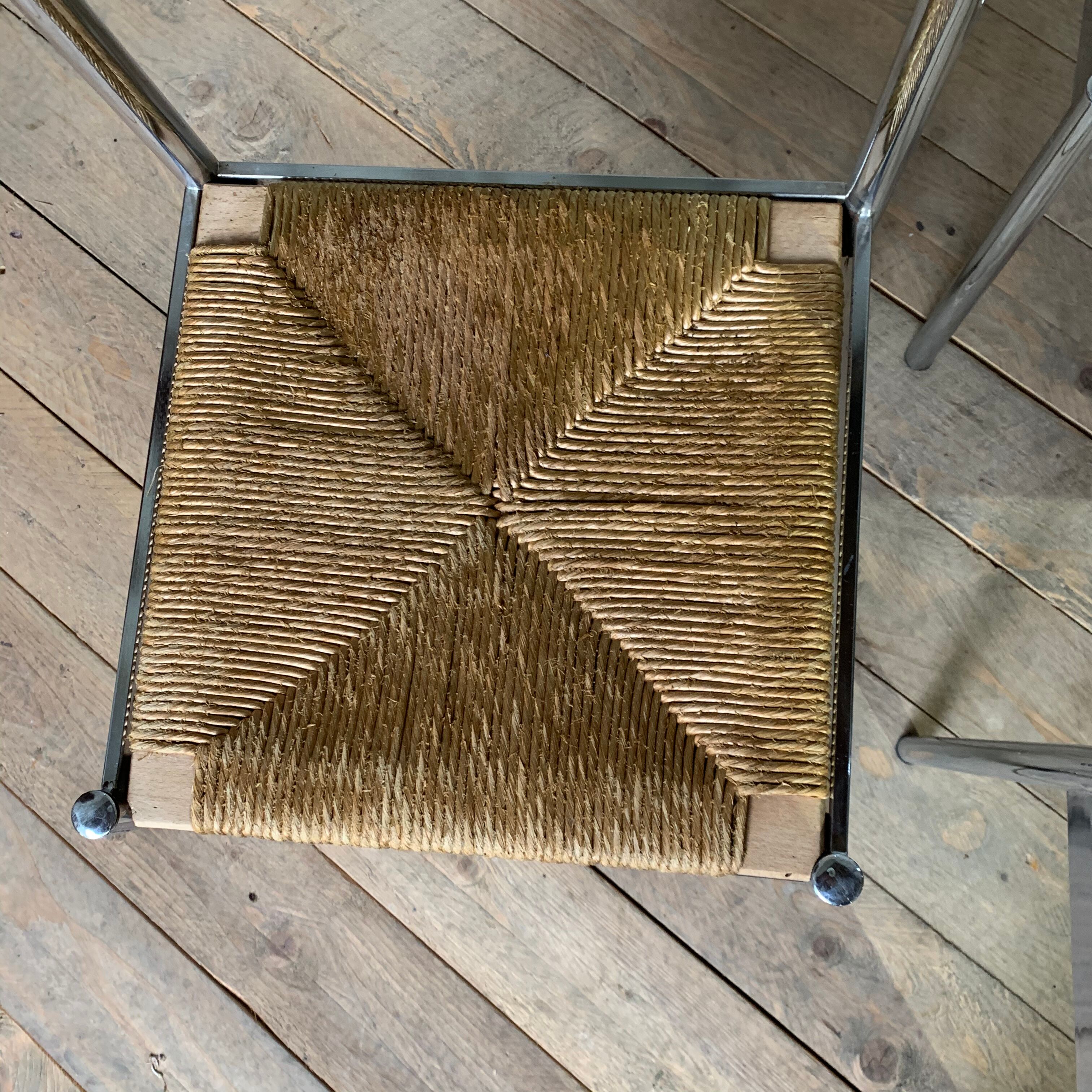 4 chrome and straw chairs