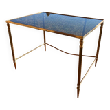 Brass side table with smoked glass.