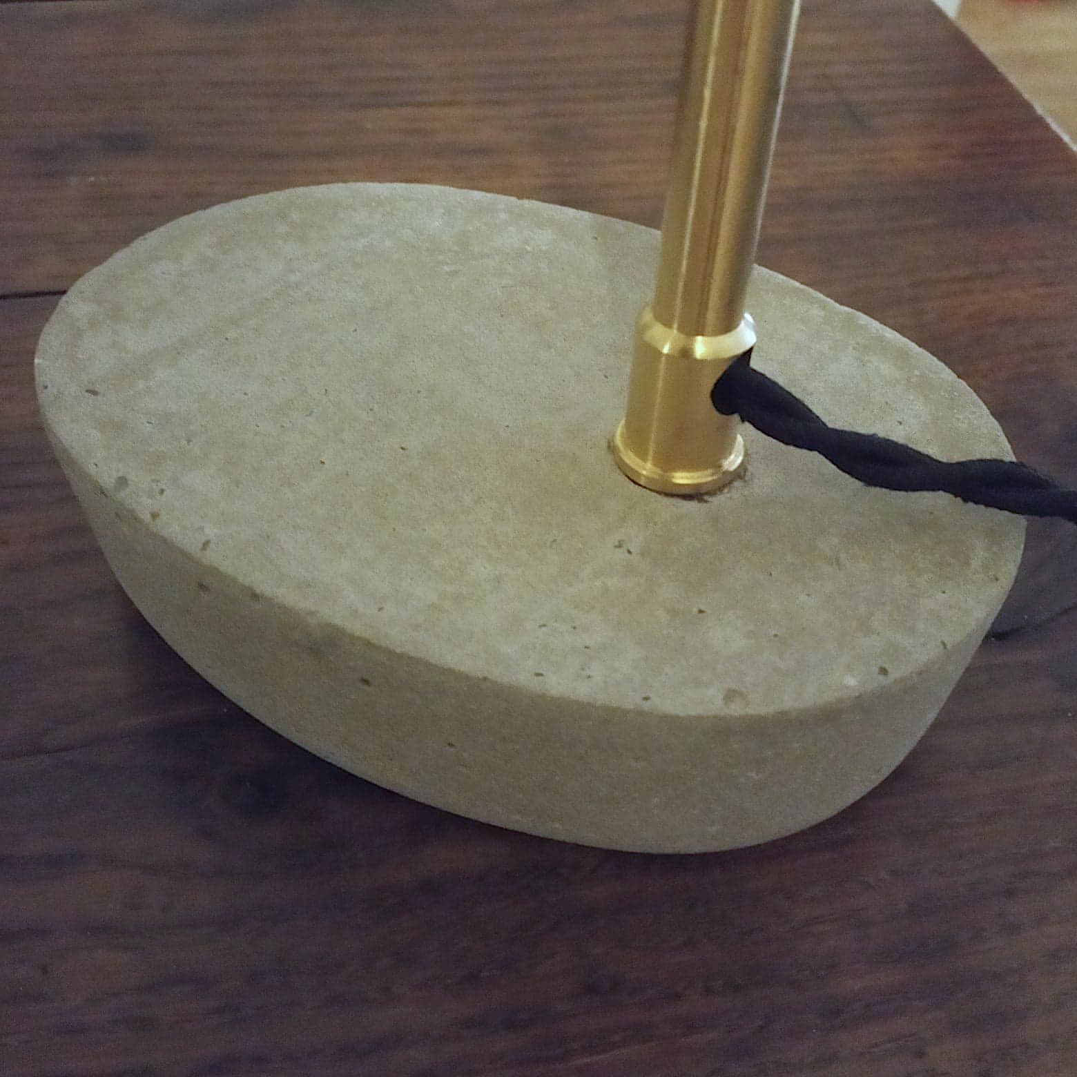 Opaline lampshade mounted on a concrete base