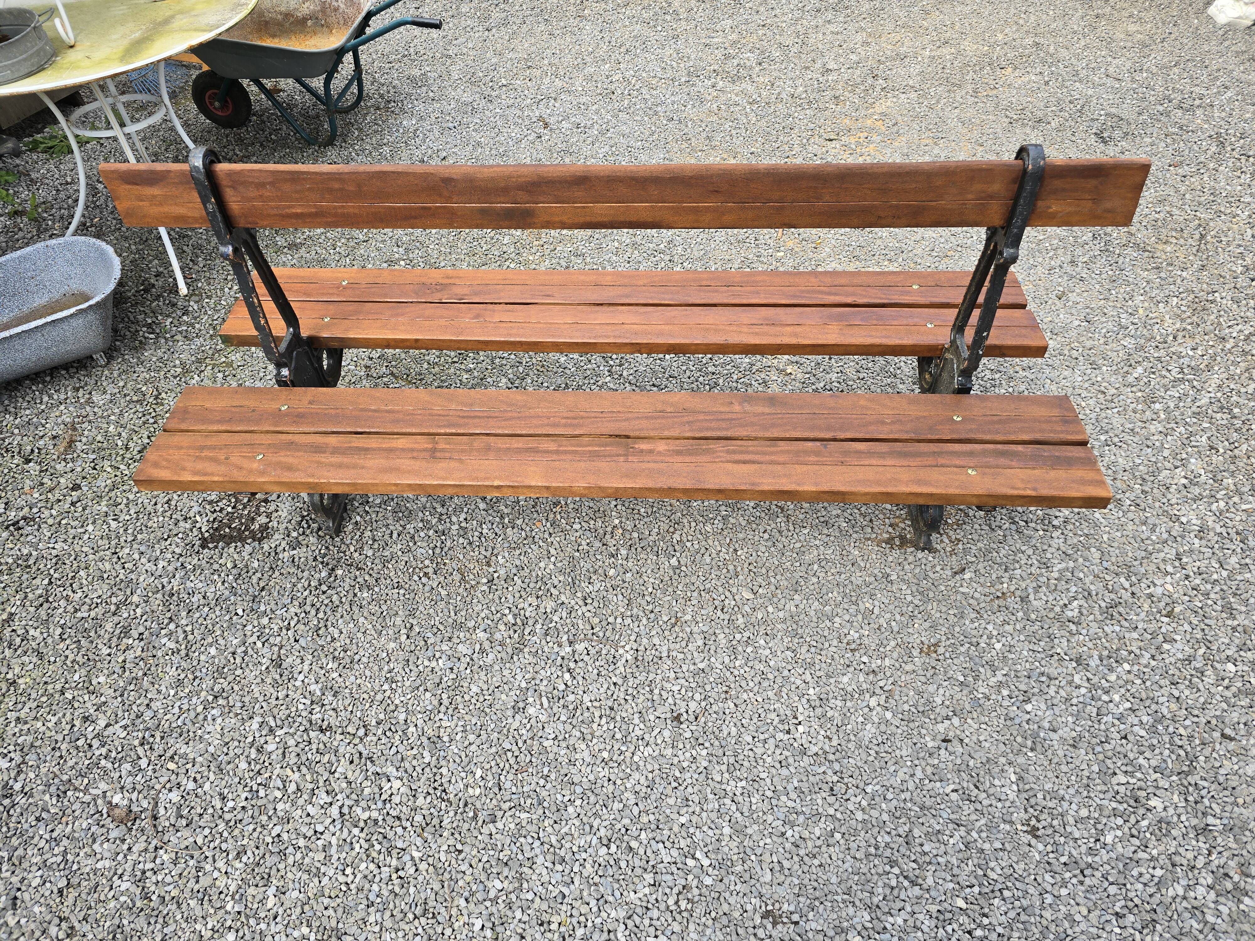 Public garden bench in the city of Paris