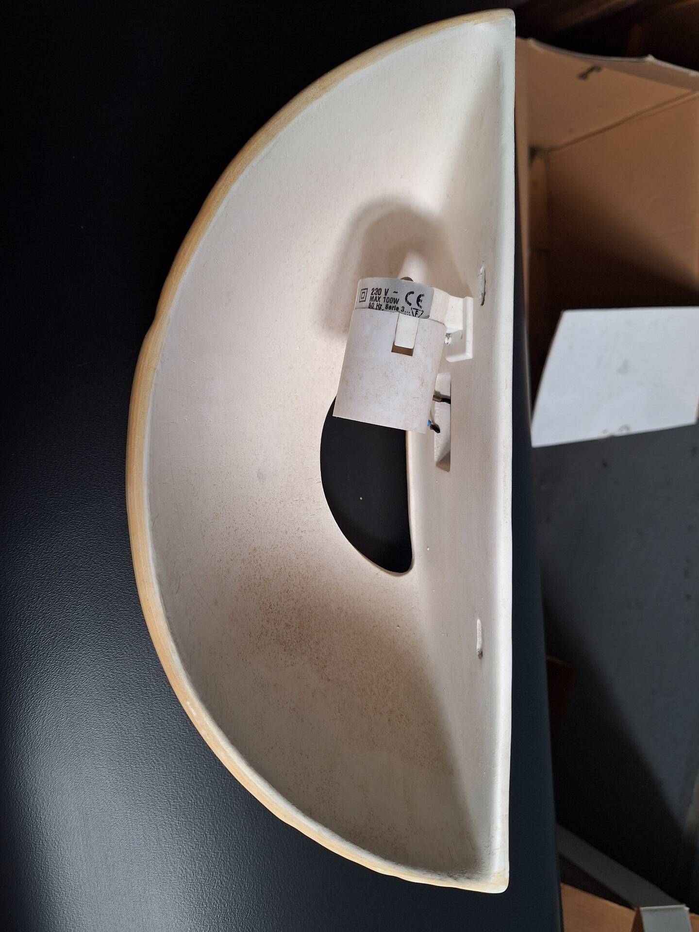 Yellow stoneware half-moon wall light