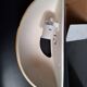 Yellow stoneware half-moon wall light