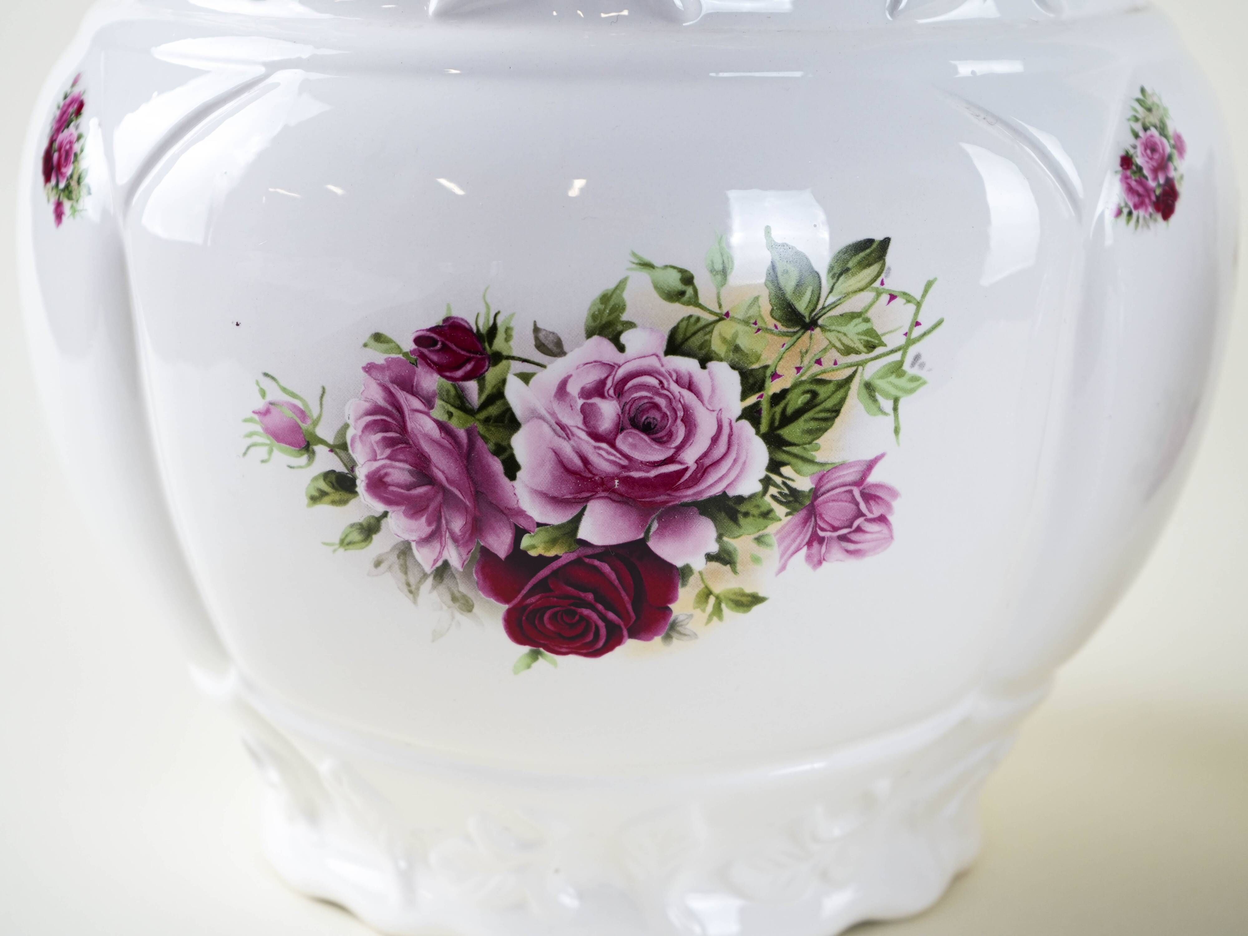Pair of decorative ceramic vases with hand-painted roses, Art Deco style, European