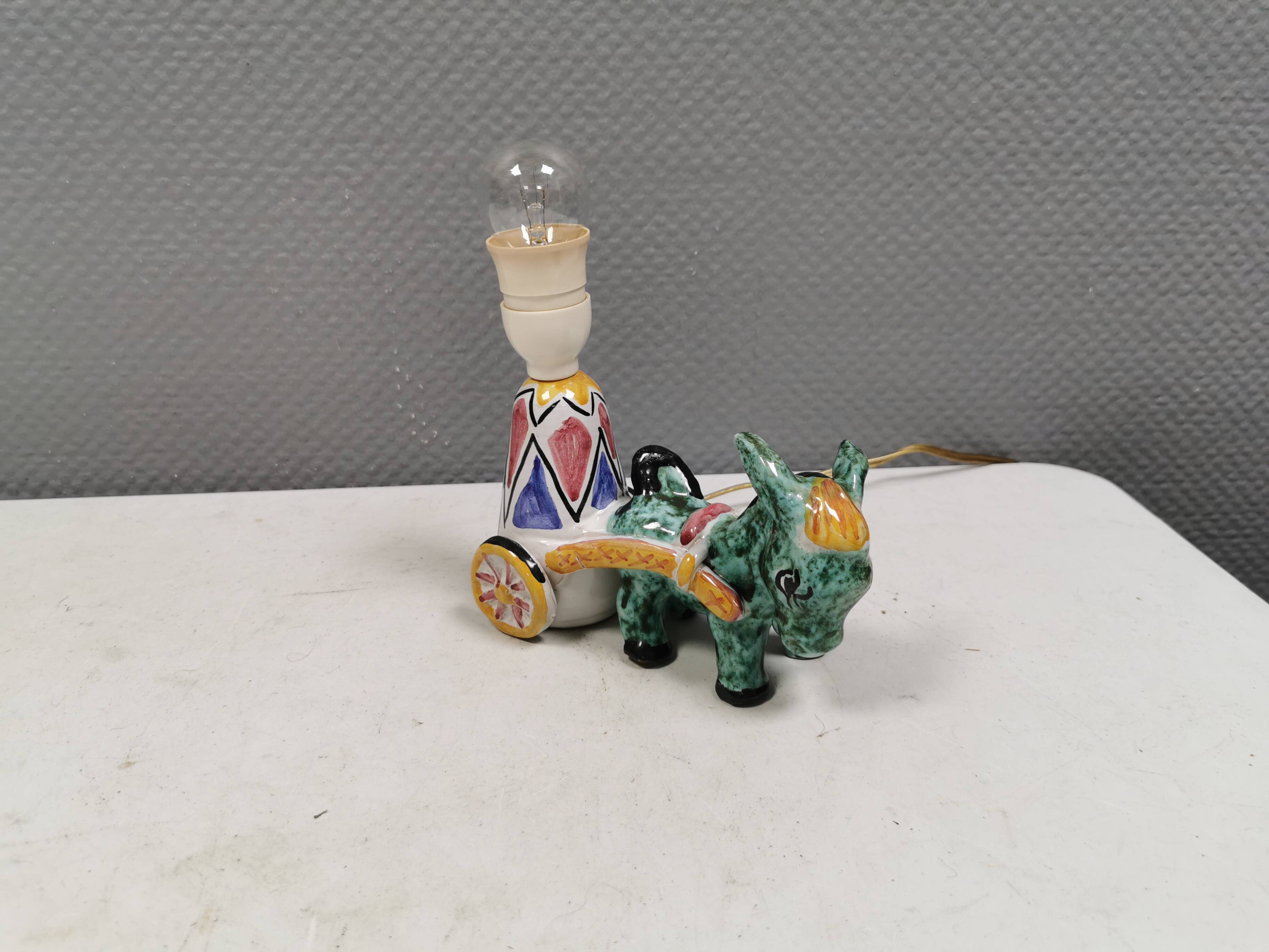 Unique "donkey" table lamp in ceramic with a harlequin pattern, Italy 1970s