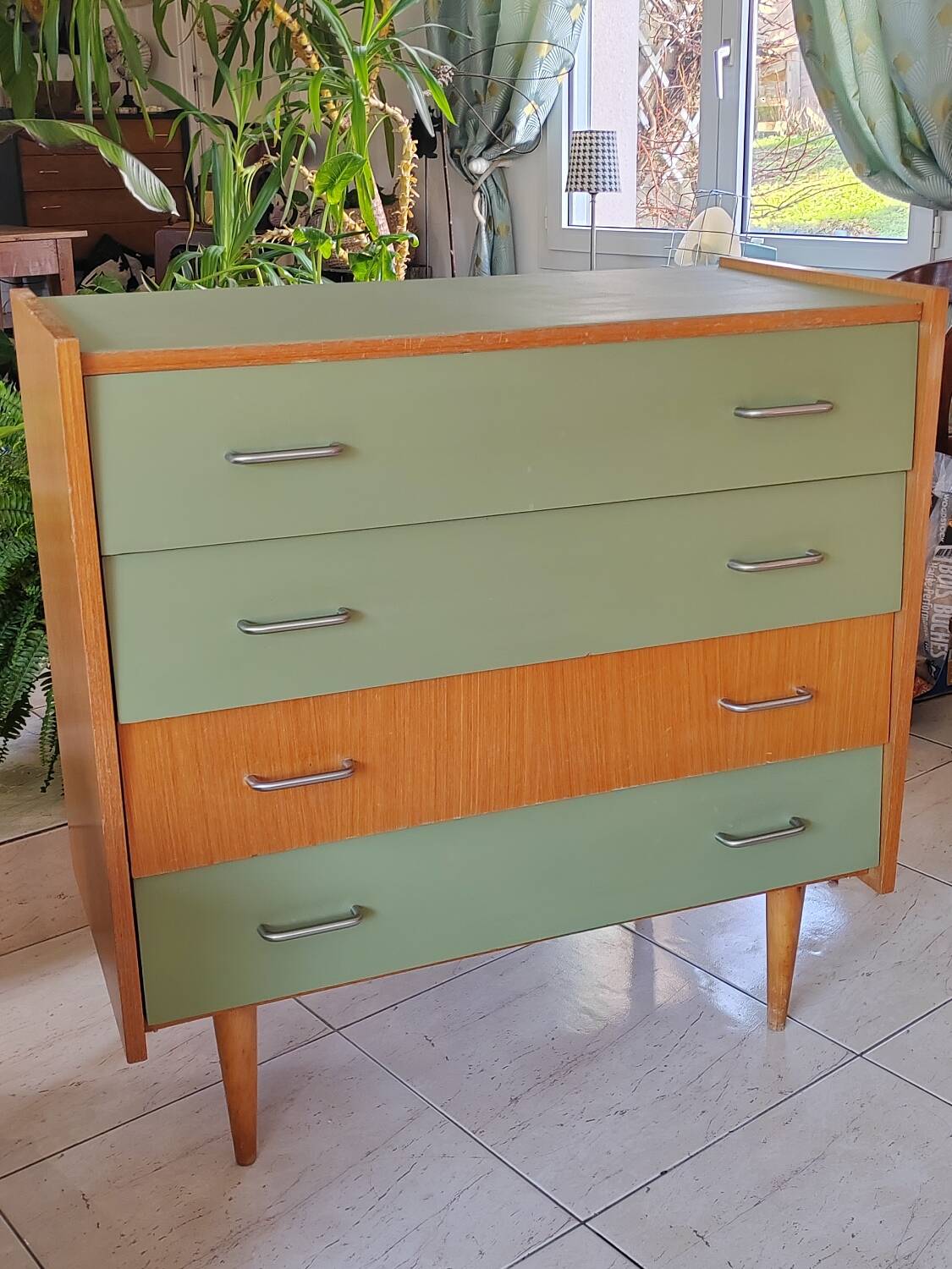 Vintage commode refurbished with tapered legs.