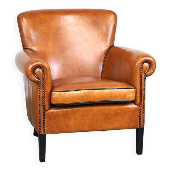 Fauteuil en cuir de mouton en excellent état