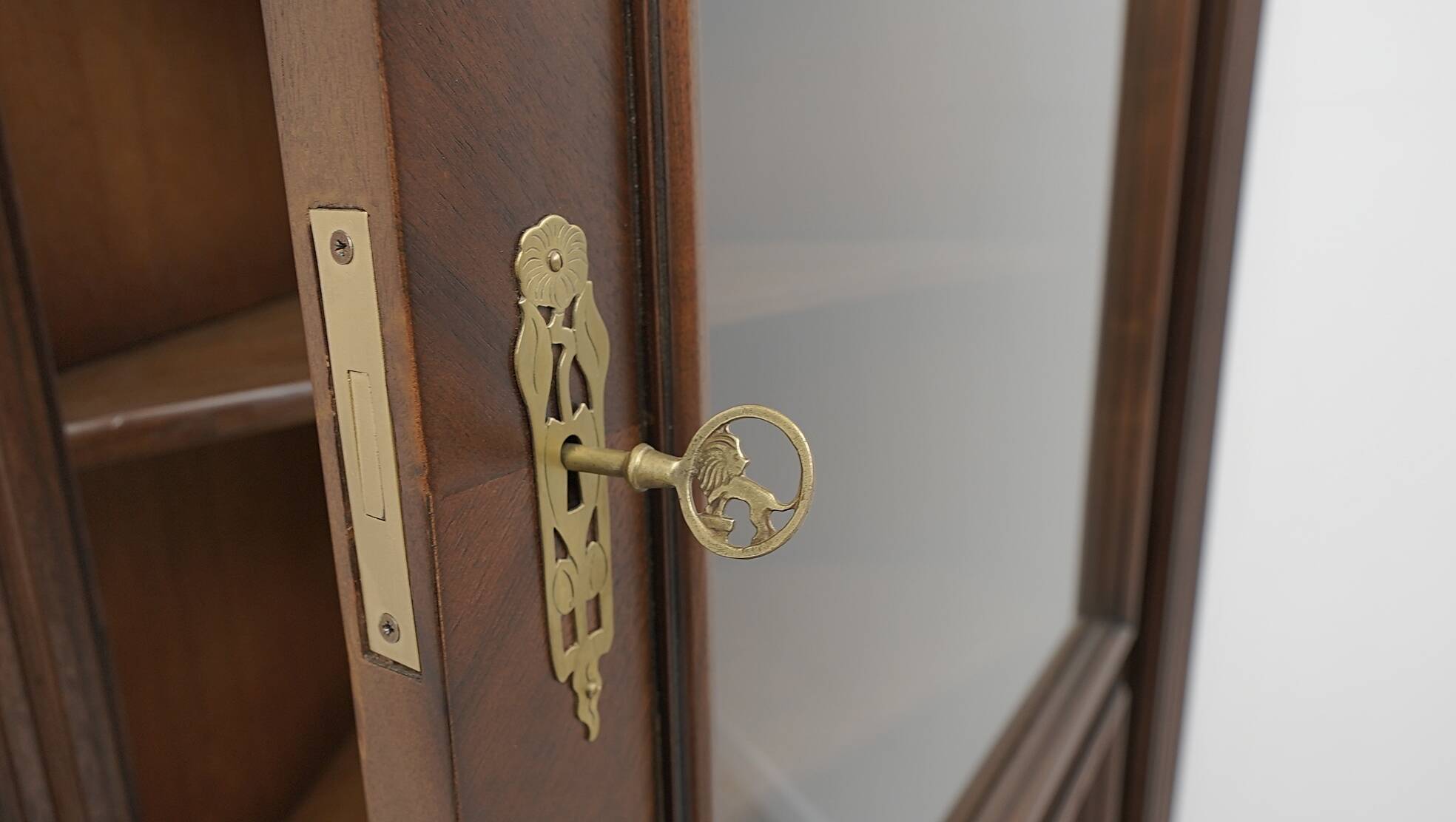 Antique French corner bookcase. After professional renovation.
