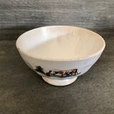 Old bowl decorated with a farmer and her cow