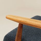 Scandinavian armchair in navy blue bouclé design by H. Lis