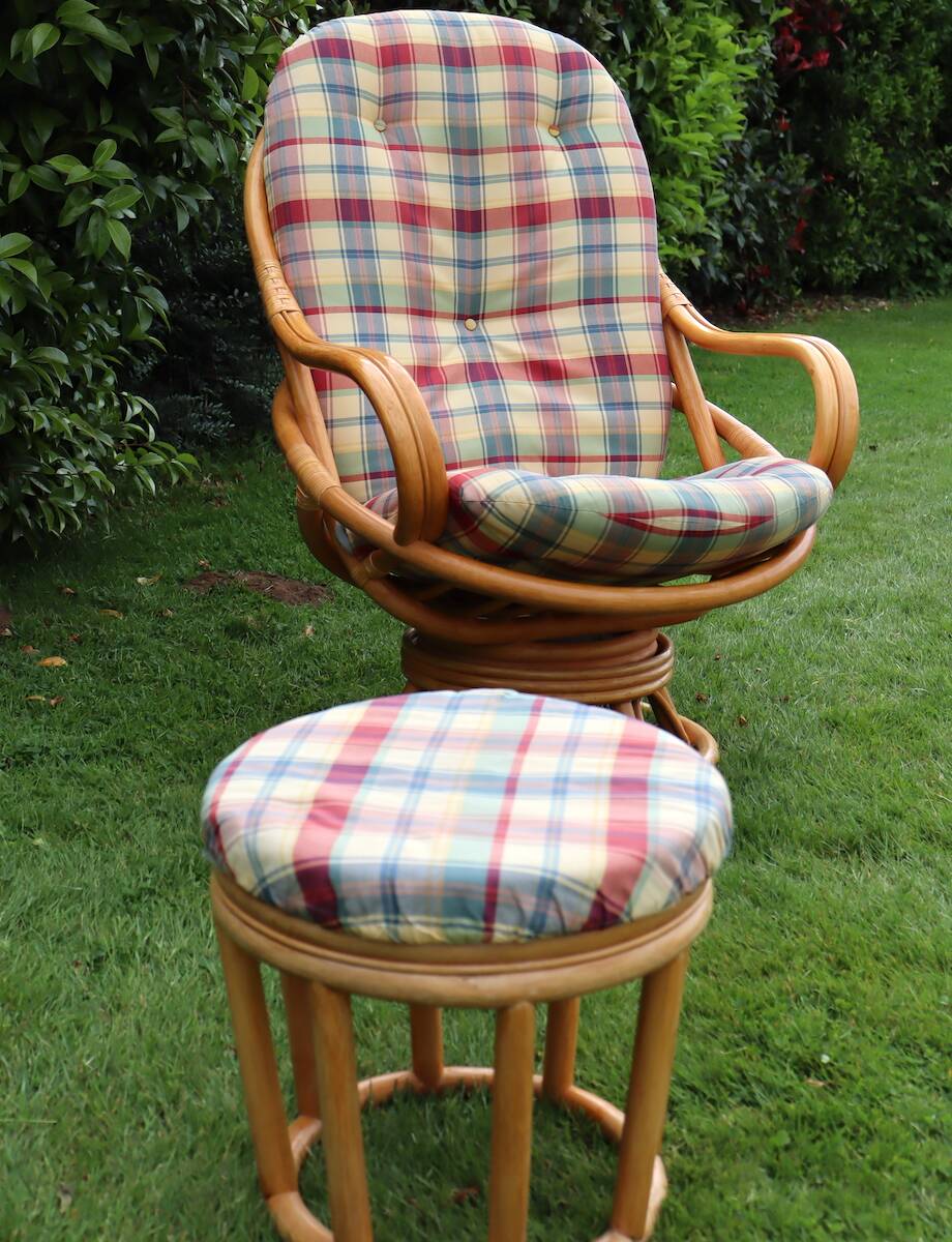 Swivel rattan armchair with matching ottoman