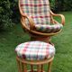 Swivel rattan armchair with matching ottoman