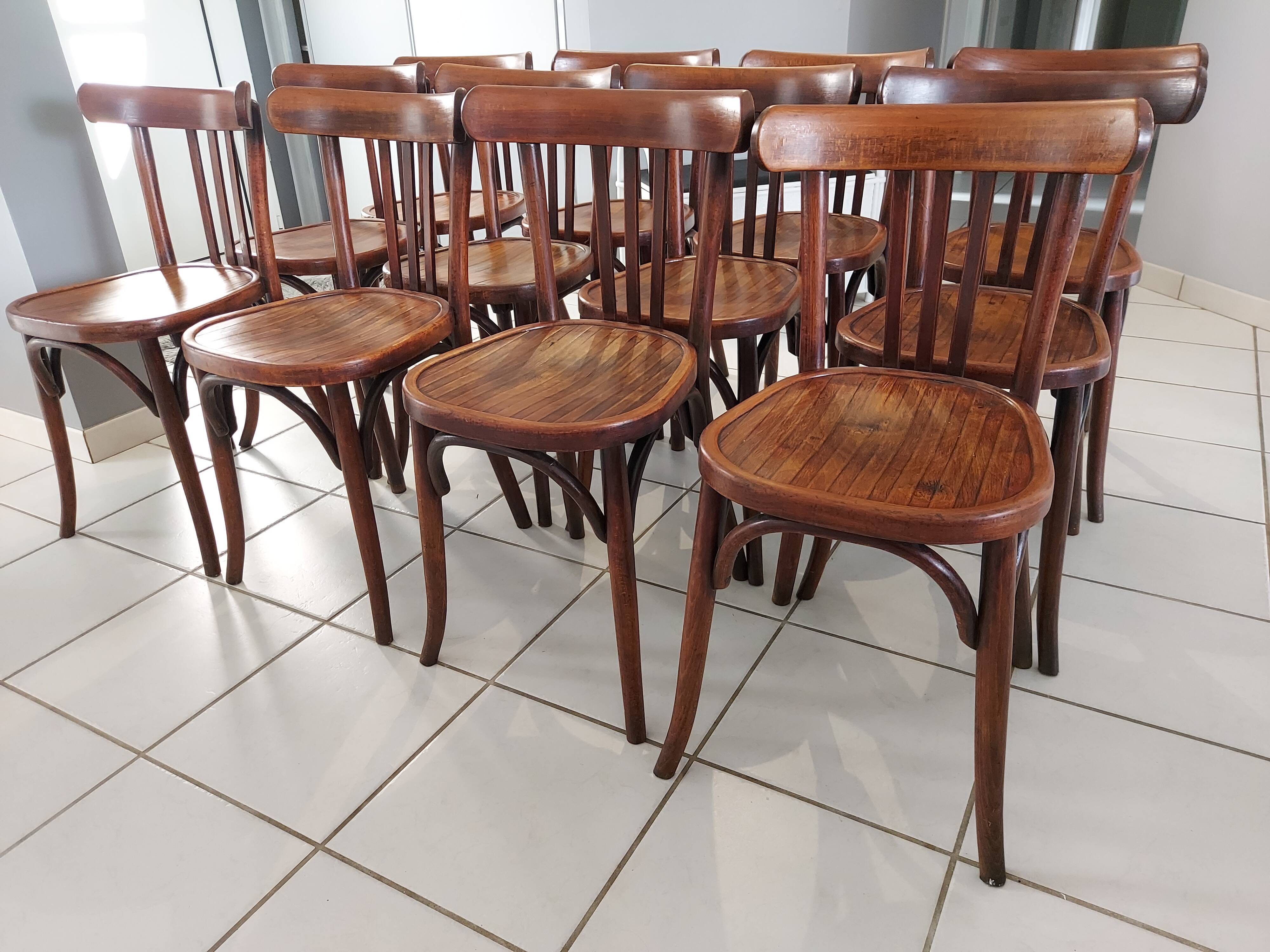 Suite of 12 chairs of bistrot Baumann 1940s