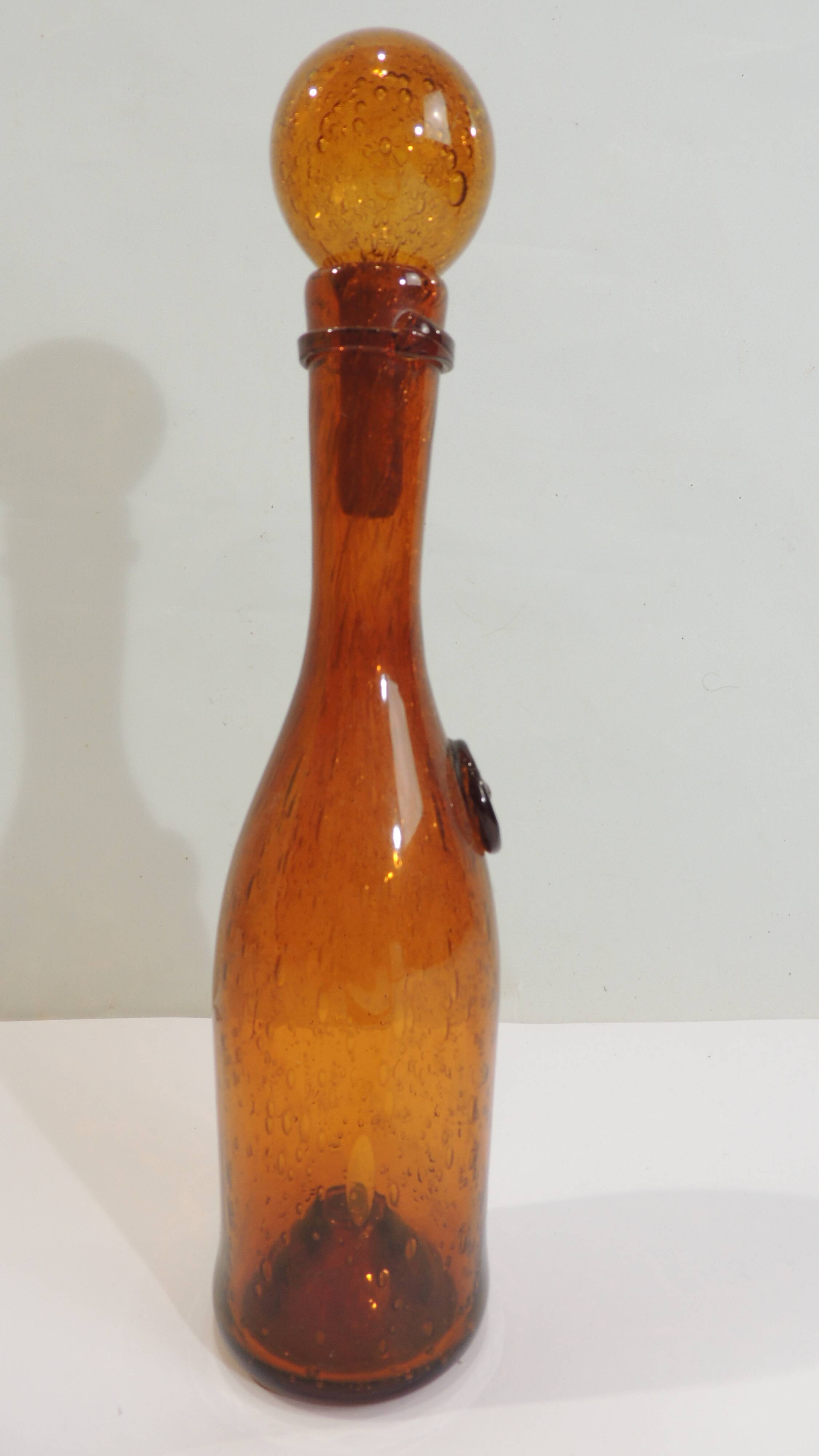 Amber bottle in bubbled blown glass, signed Biot – France, vintage 1970s
