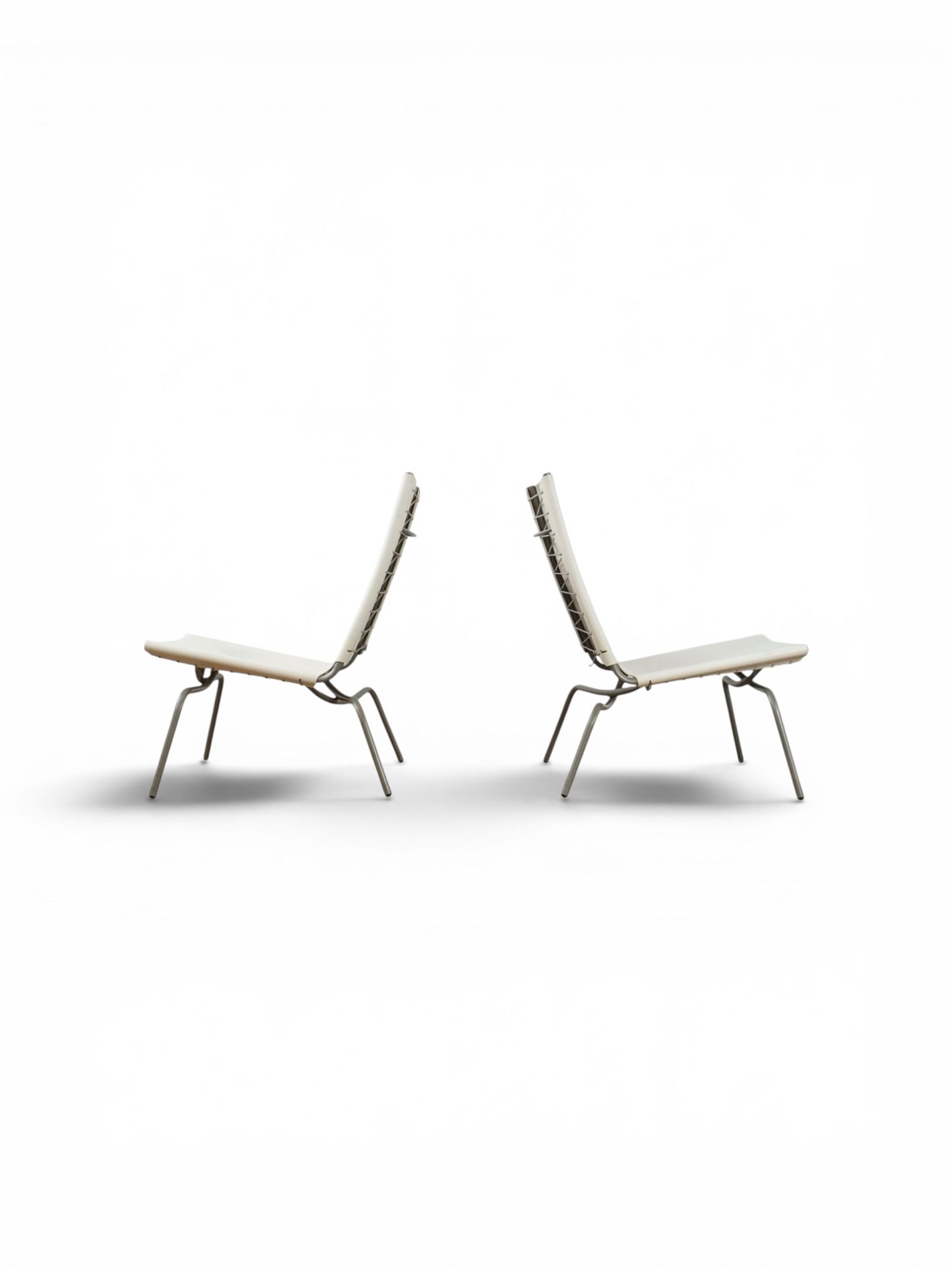 Set of 2 Crossed Legged lounge chairs by Fabiaan van Severen.