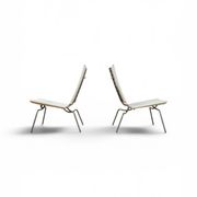 Set of 2 Crossed Legged lounge chairs by Fabiaan van Severen.