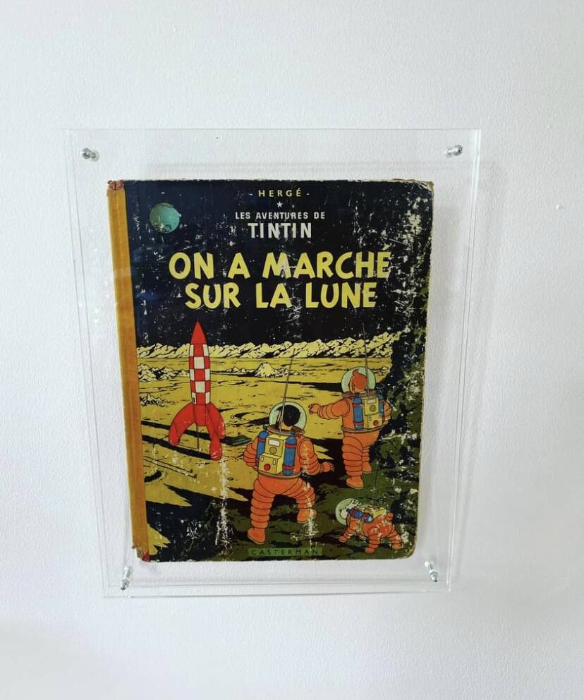 Plexiglas frame with original comic book