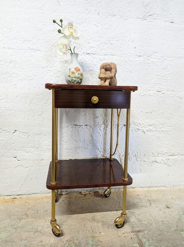 Vintage bedside table with wheels