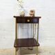 Vintage bedside table with wheels