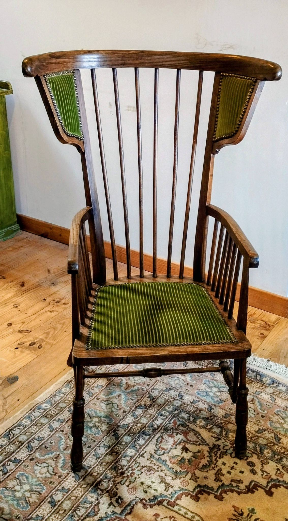 1900s Arts and Crafts style tapered wingback armchair