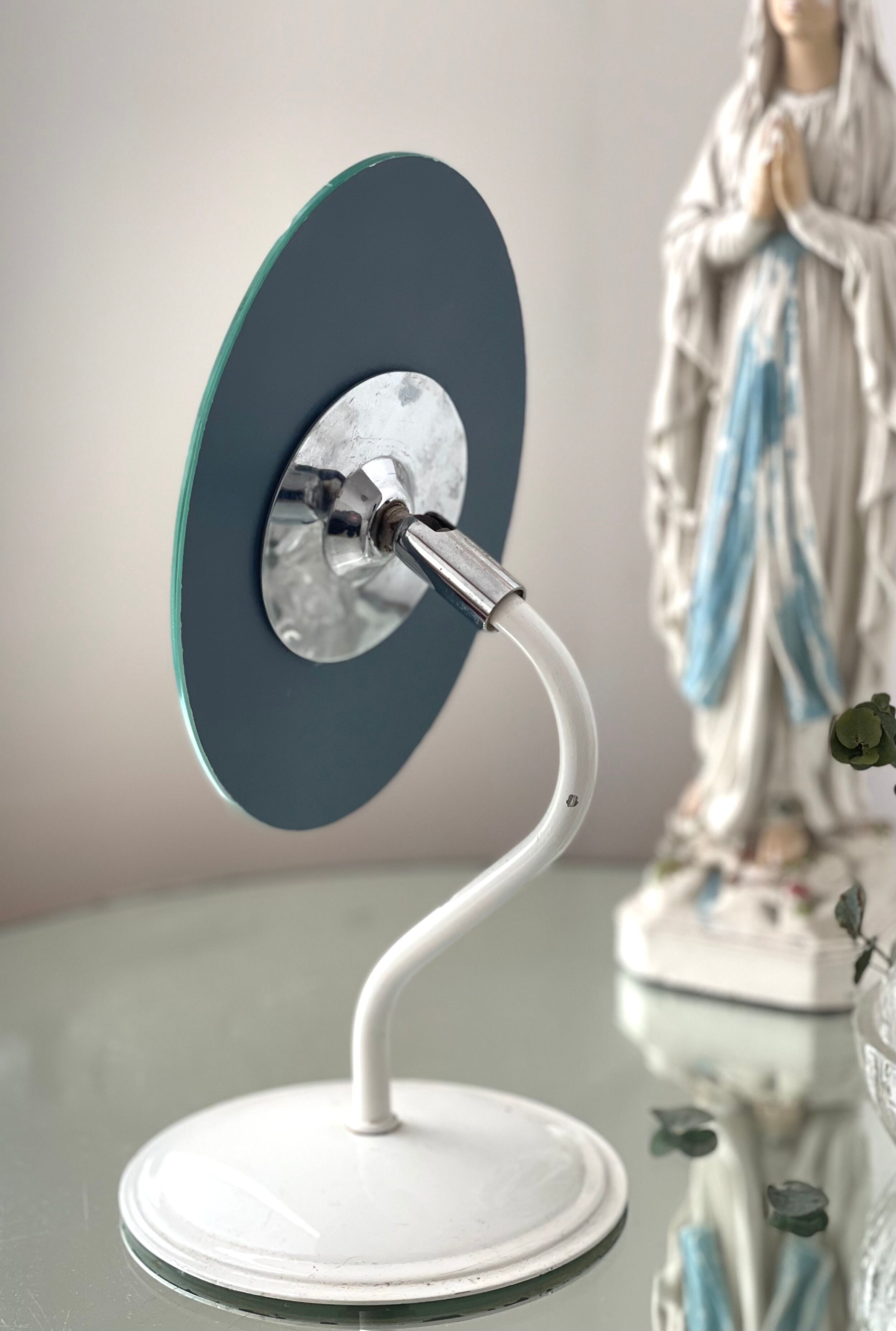 Beveled mirror on stand