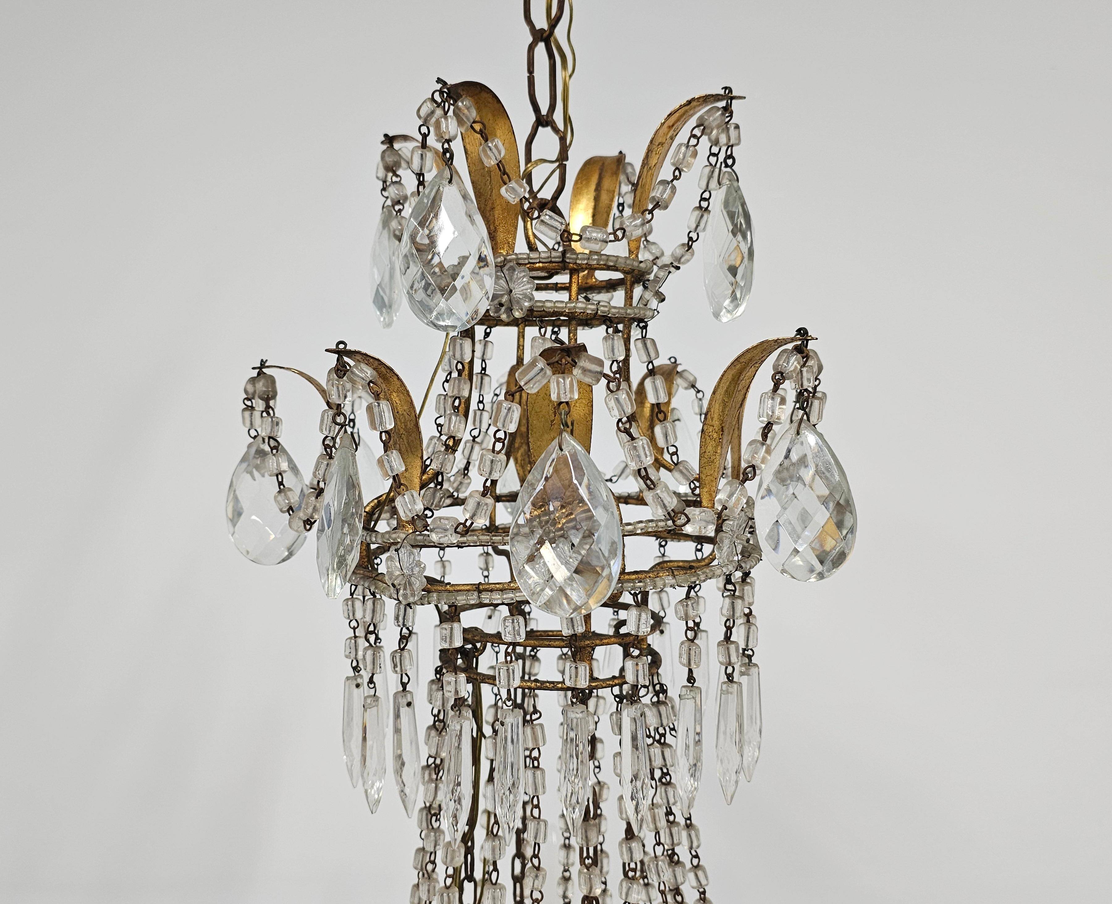 Antique crystal chandelier with floral details 1910