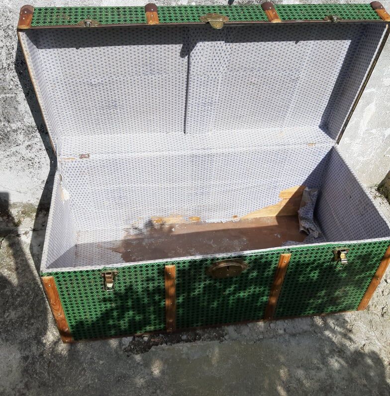 Vintage green metal trunk