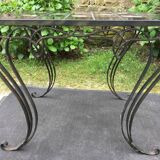 Vintage ceramic coffee table by Guy Trévoux with wrought iron base.