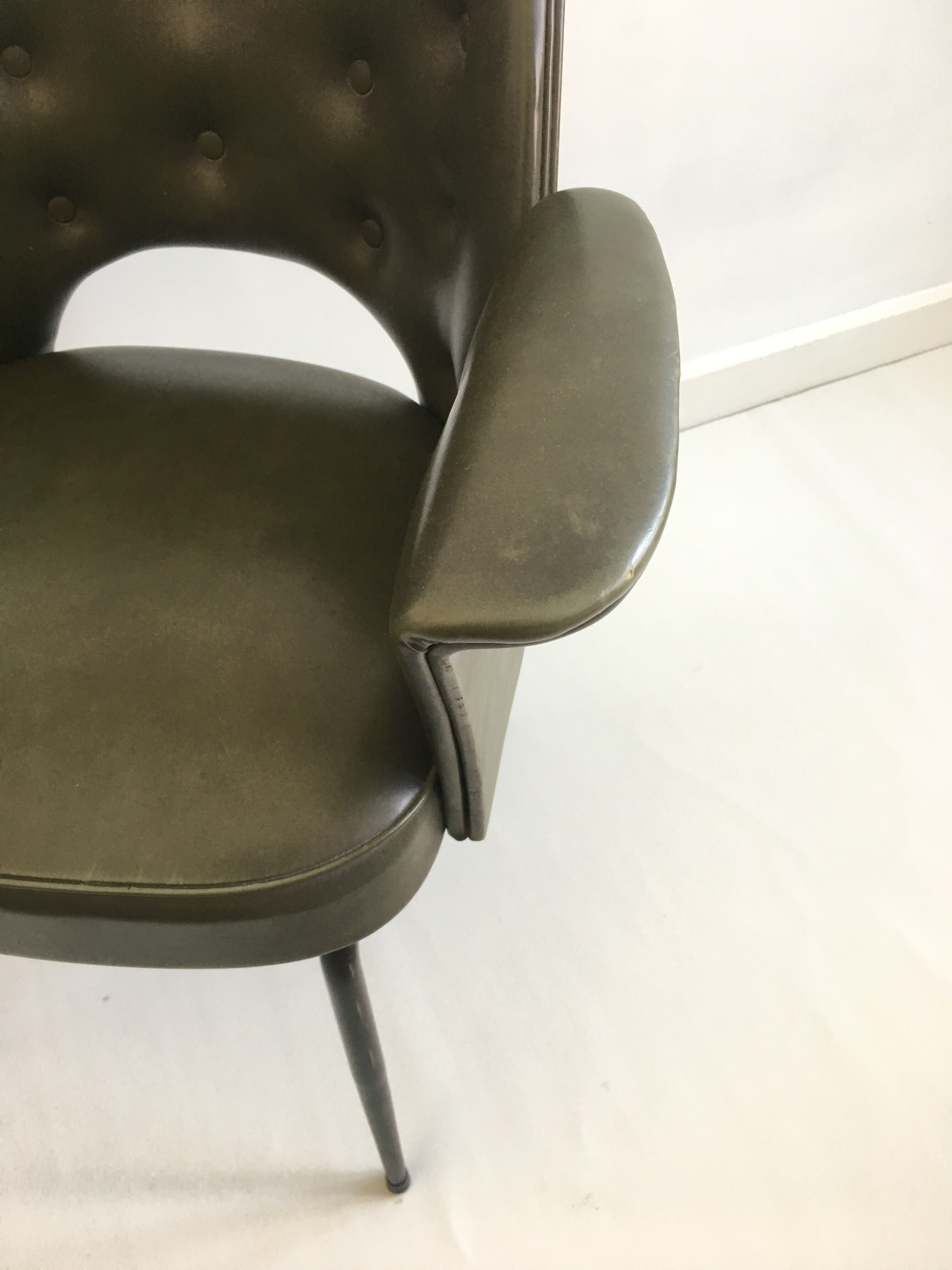 Chair in bottle green leatherette