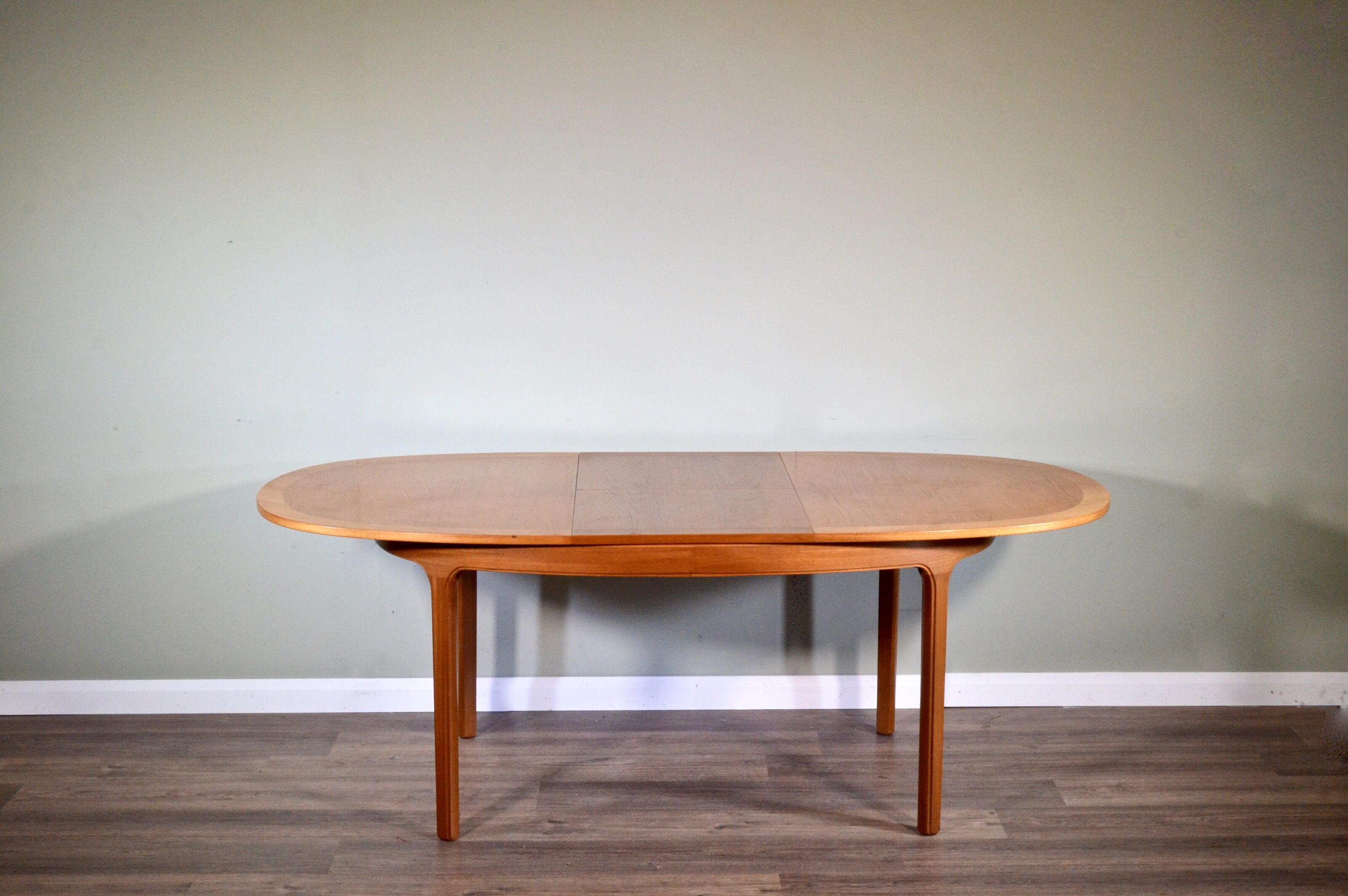 Midcentury oblong teak extending table by Nathan