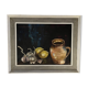 Tableau nature morte à la cruche aux ails et citrons