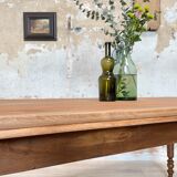 Vintage farmhouse table with turned legs.