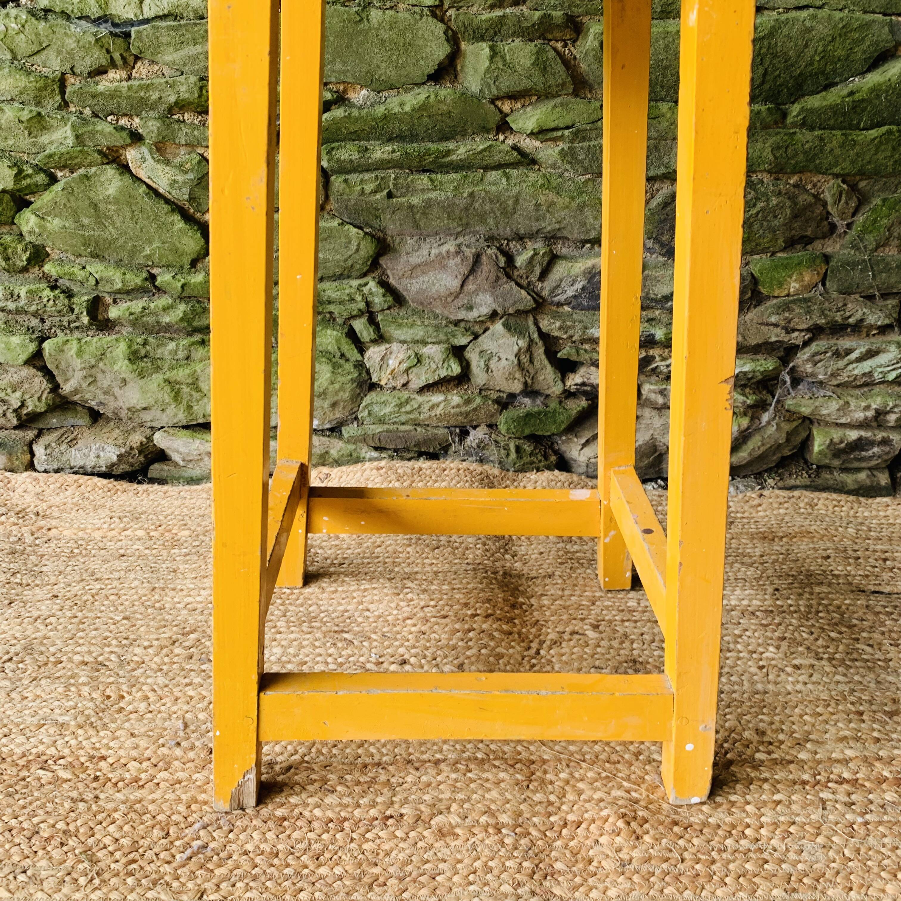 Yellow wooden high stool