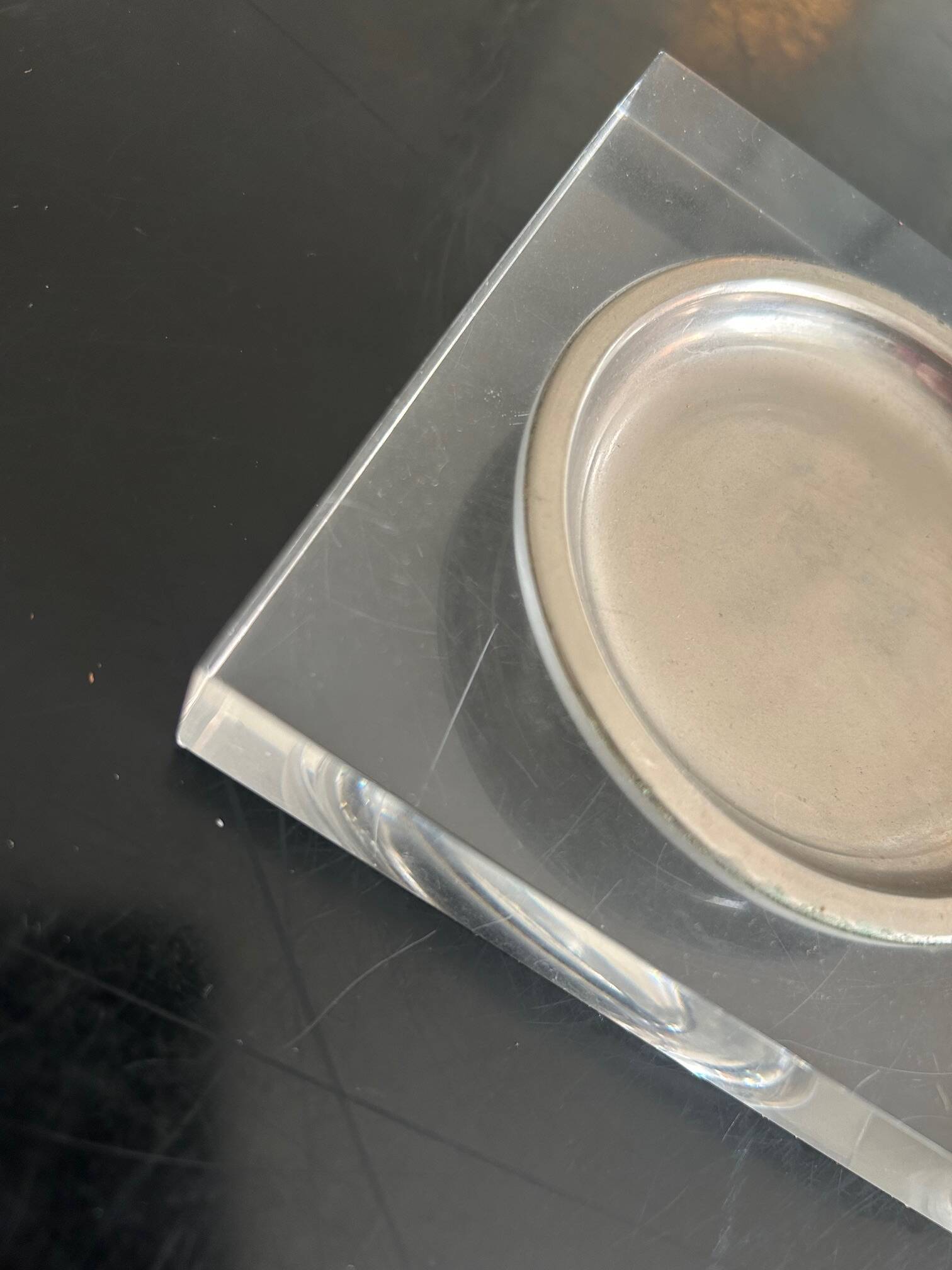 Plexiglass pocket emptier 1970