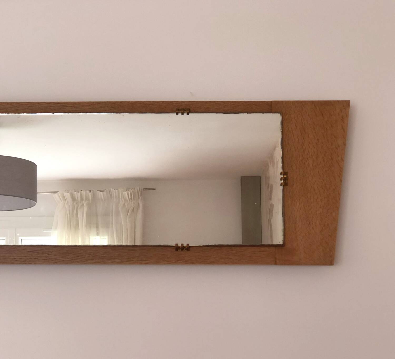 Trapezoidal mirror in solid oak
