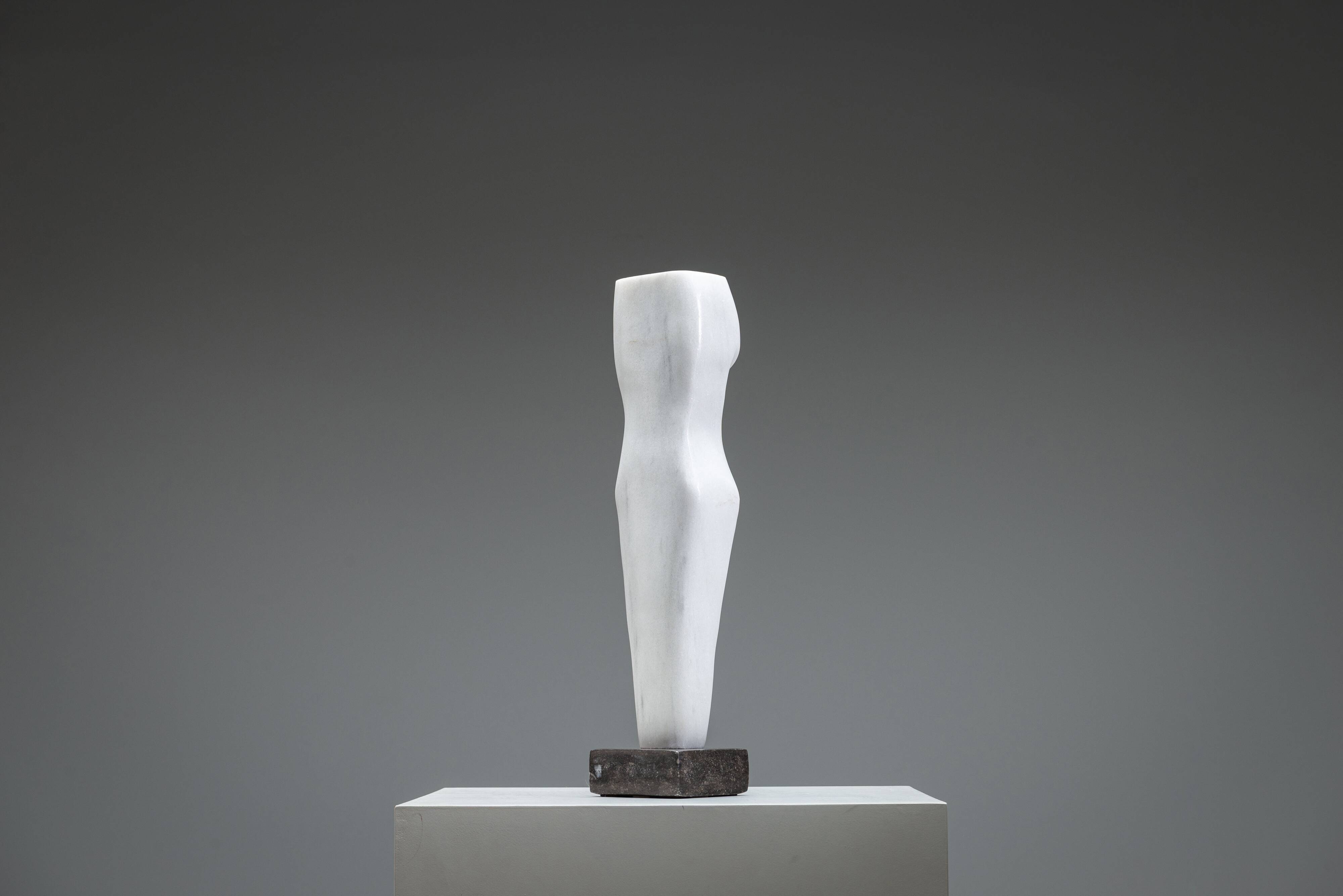 Abstract solid white marble torso