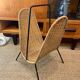 Danish magazine rack in metal and woven wicker