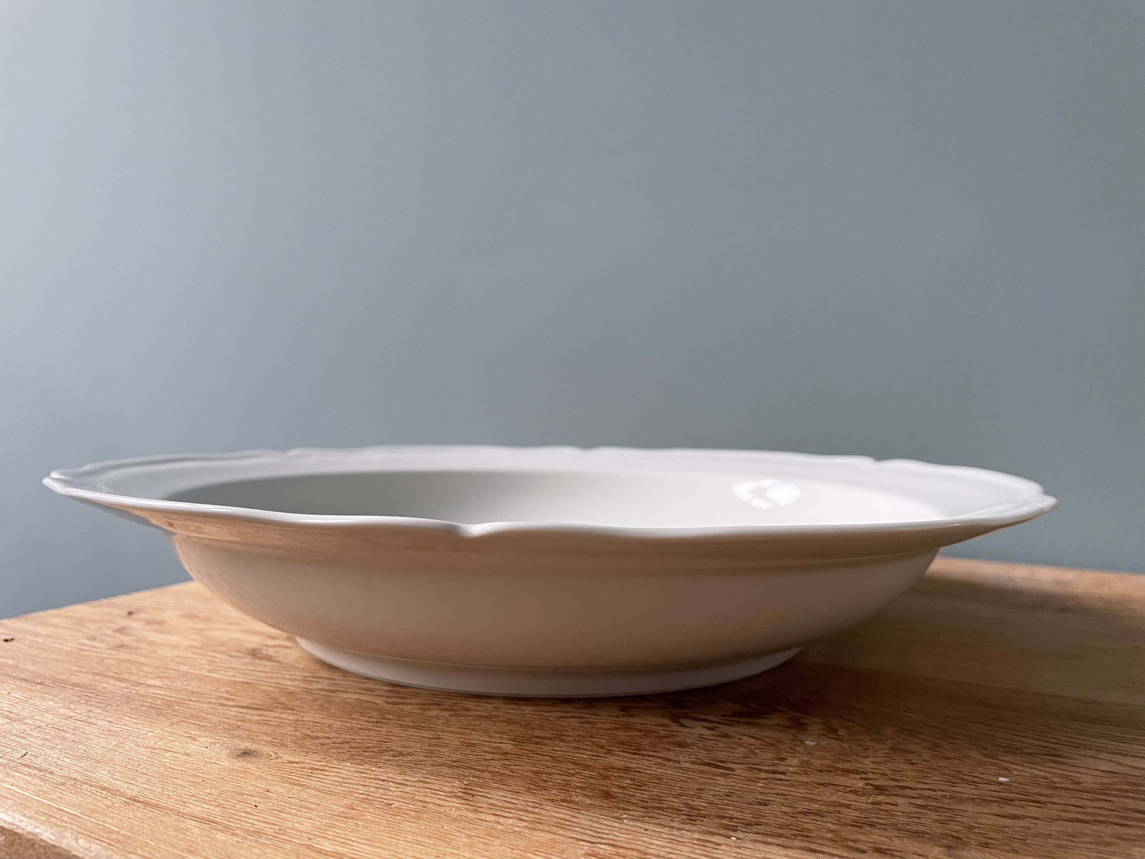 Old hollow round dish in Limoges porcelain