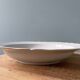 Old hollow round dish in Limoges porcelain