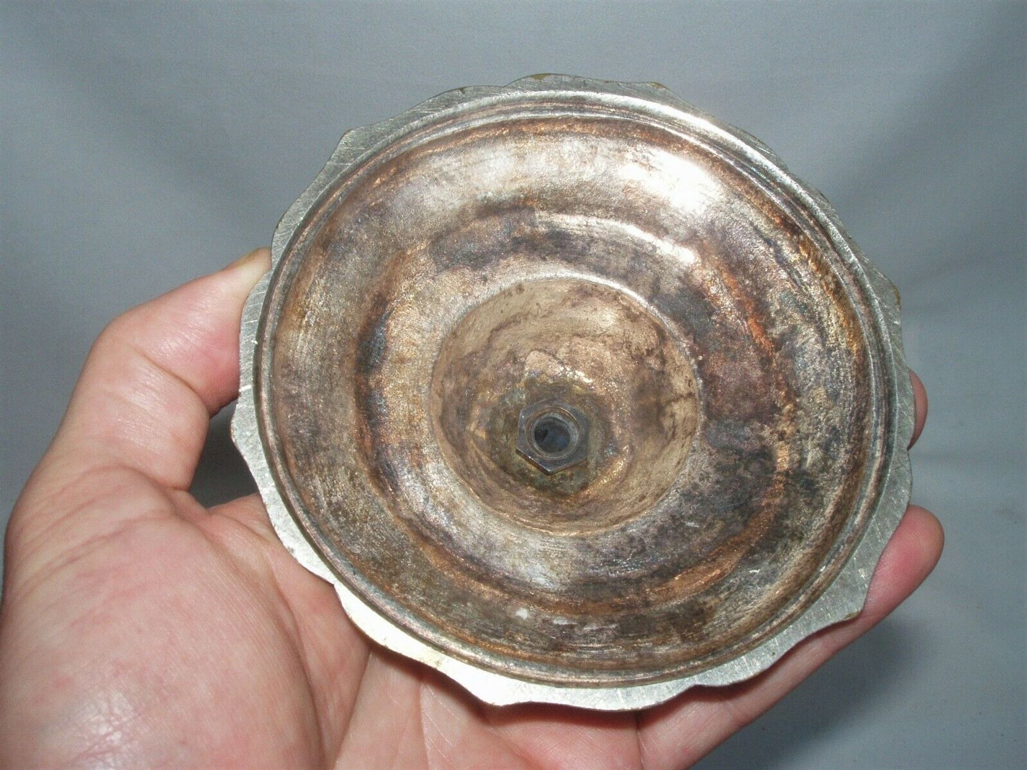 Two-branch silver-plated candle holder from the early twentieth century.