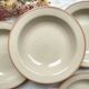 6 Deep plates in speckled beige stoneware, Tulowice style, Poland 1970