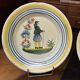 Pair of Quimper earthenware plates from the 1930s.