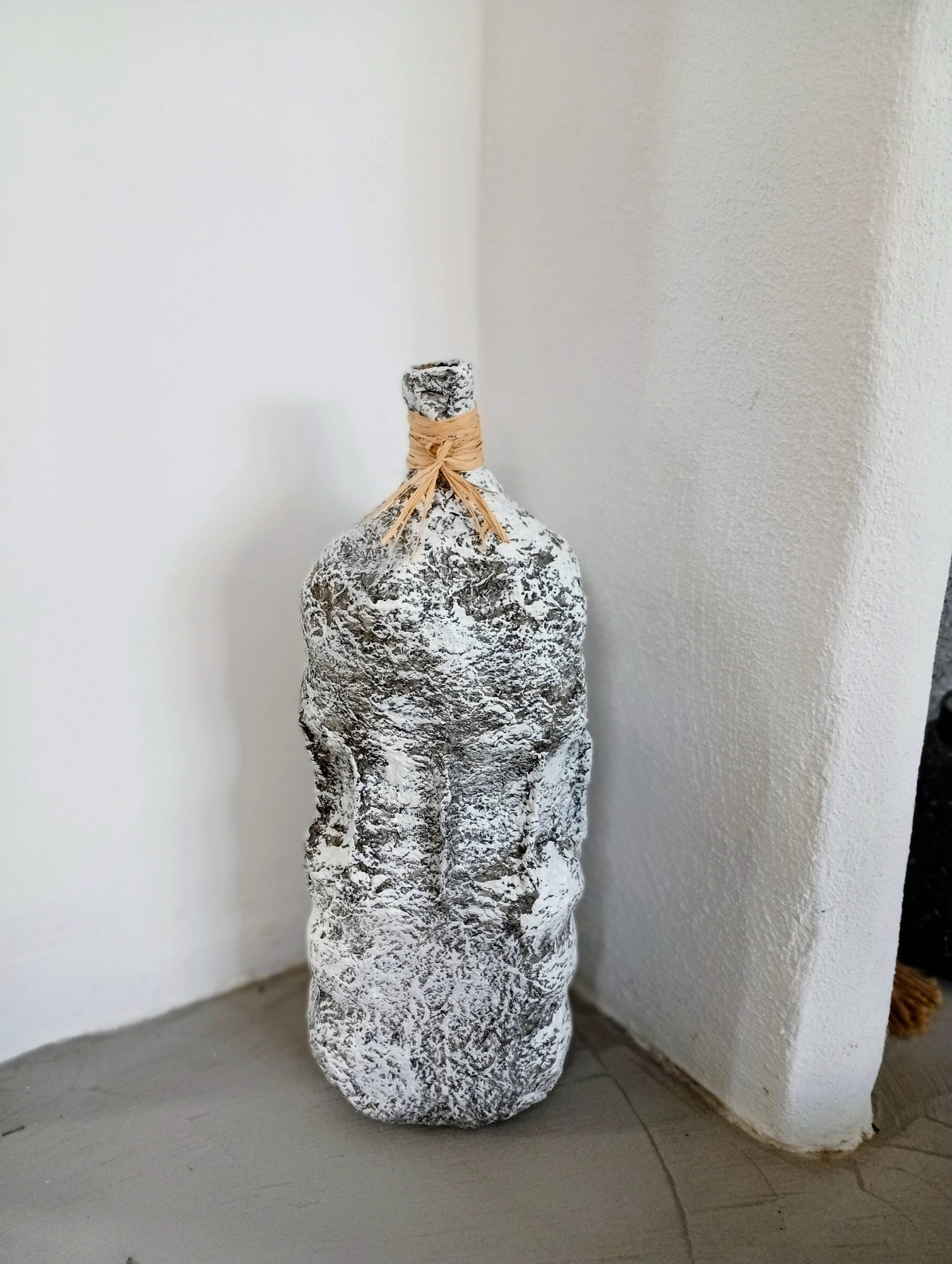 Sculptural vase with a stone effect. Wabi-sabi. Bohemian.